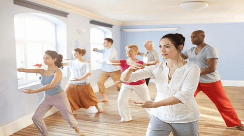 Embrace the vitality and unity of a Tai Chi group class with young participants in this captivating image. Witness the graceful movements and focused minds as they engage in this holistic mind-body exercise. Experience the contagious energy and camaraderie as they cultivate strength, balance, and tranquility together. Join the Tai Chi community and discover the transformative power of this ancient practice for people of all ages.